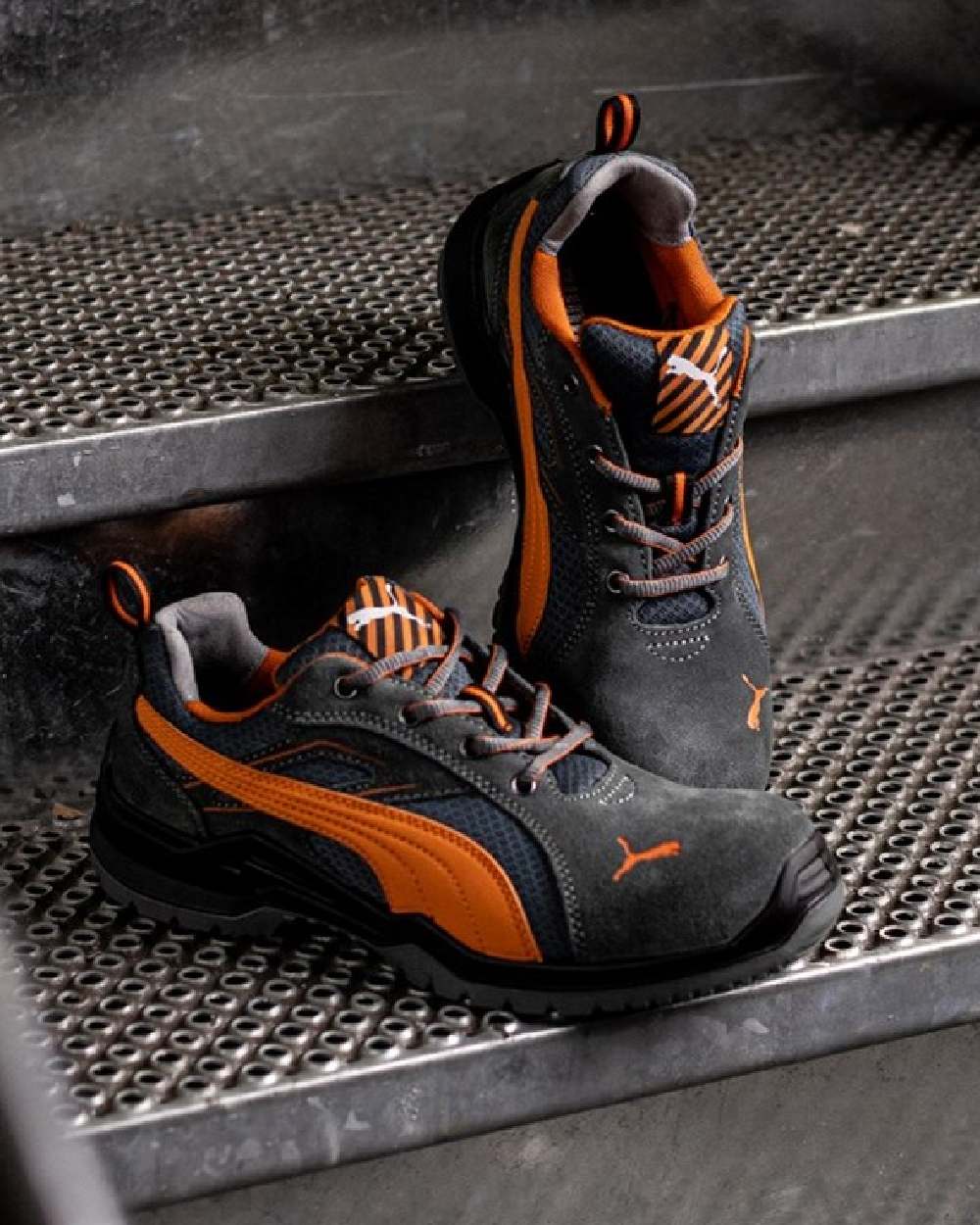 Orange Coloured Puma Safety Mens Omni Flash Low Safety Trainers on outdoor background 