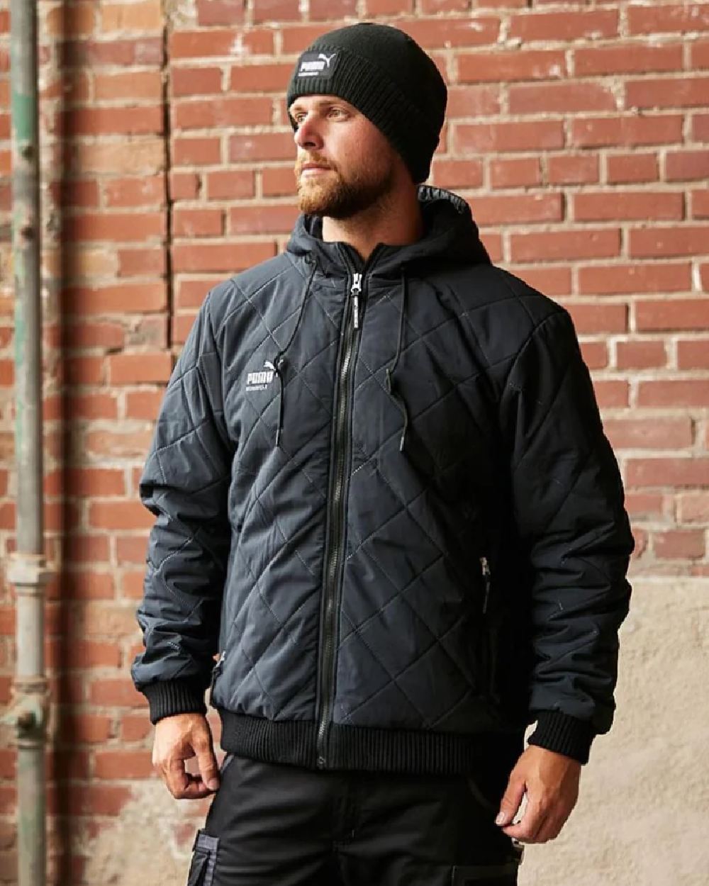 Carbon Coloured Puma Workwear Beanie on outdoor background 