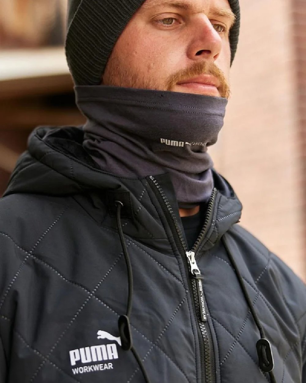 Ebony Coloured Puma Workwear Mens Multifunctional Scarf on outdoor background 