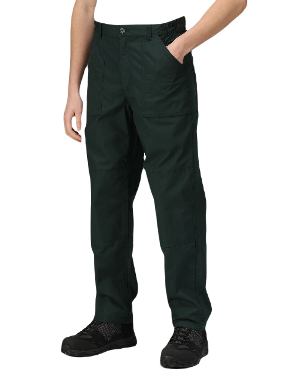 Green coloured Regatta Action Trousers on white background 