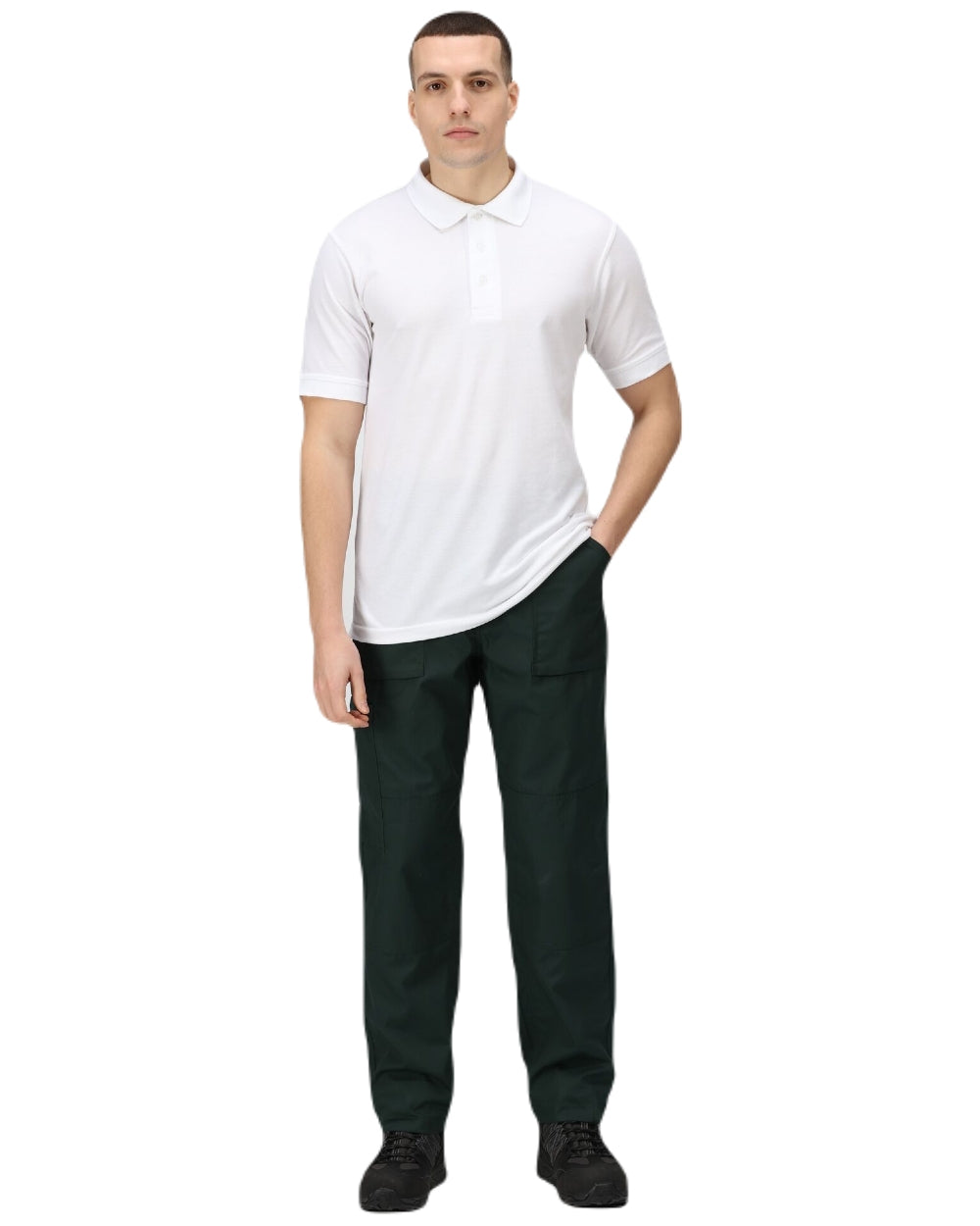 Green coloured Regatta Action Trousers on white background 