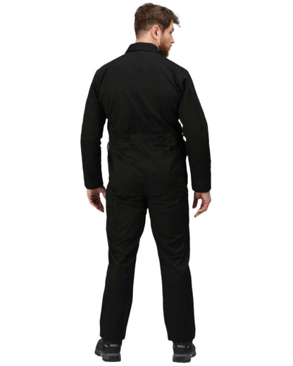 Black coloured Regatta Pro Stud Fasten Coverall on white background 