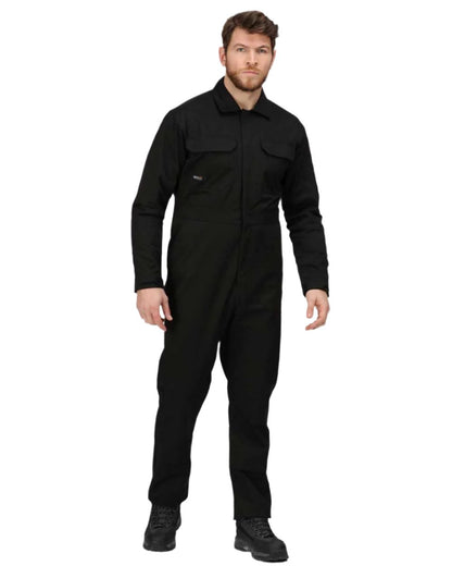 Black coloured Regatta Pro Stud Fasten Coverall on white background 