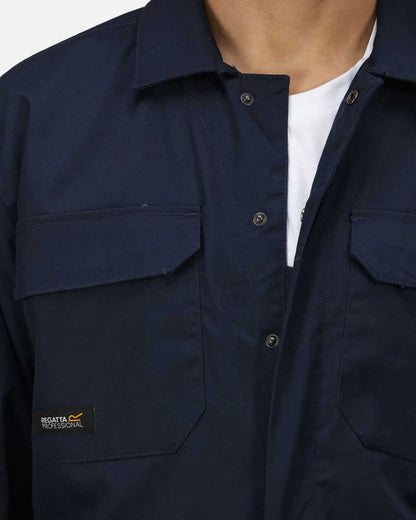 Navy coloured Regatta Pro Stud Fasten Coverall on white background 