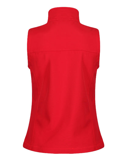 Classic Red coloured Regatta Professional Womens Flux Softshell Bodywarmer on beige background 