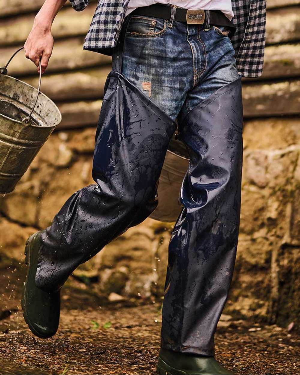 Navy coloured Regatta Stormflex Chaps on blurry background 