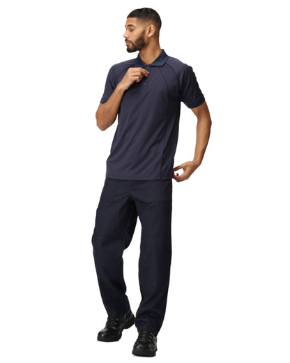 Navy coloured Regatta Mens Multi Pocket Action Trousers Short Leg on white background 