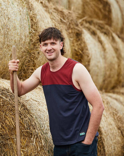 Navy Multi coloured Ridgeline Backslider Singlet Top on haystack background 