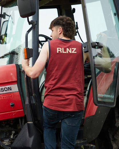 Rhubarb Multi coloured Ridgeline Backslider Singlet Top on haystack background 