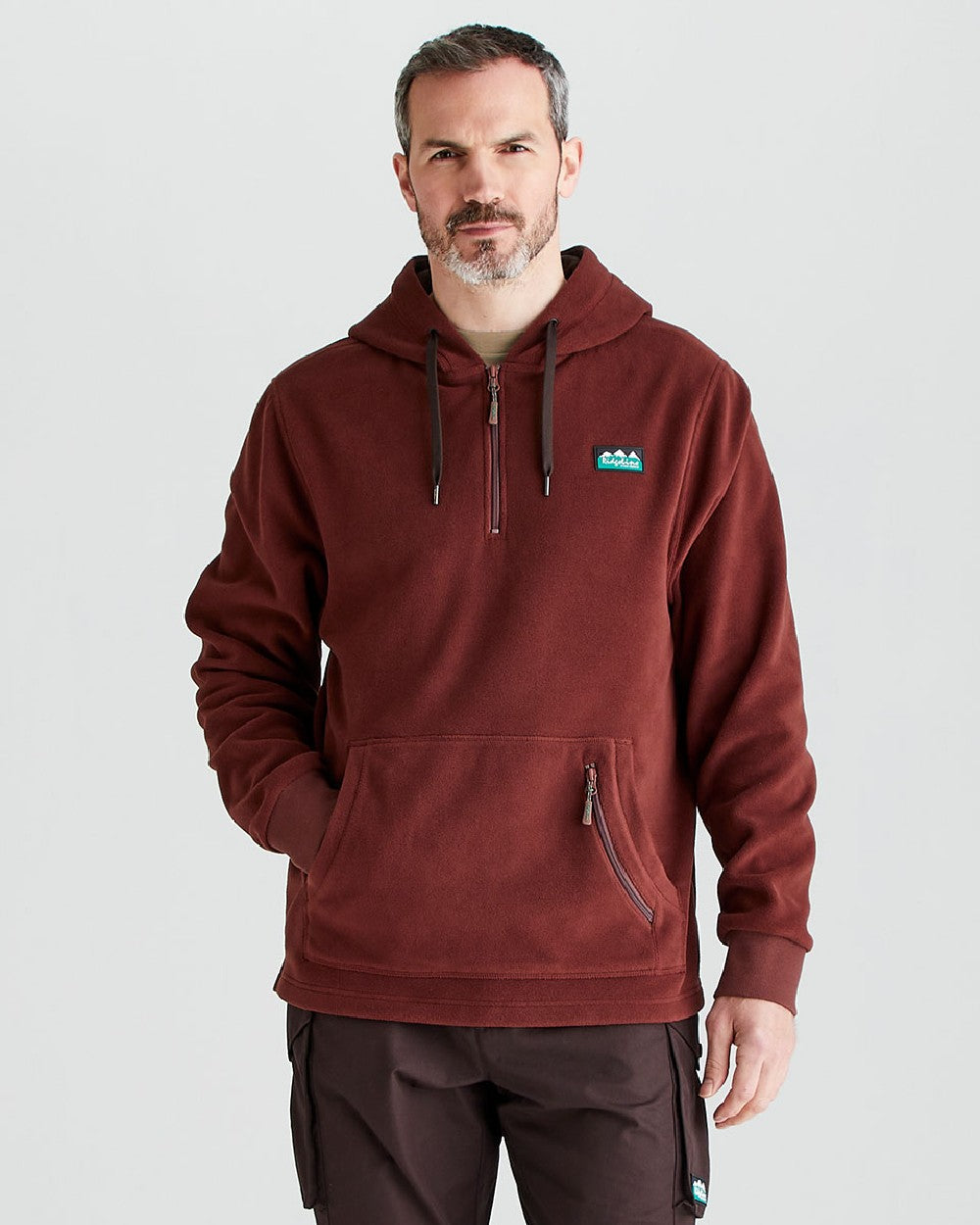 Oxblood coloured Ridgeline Ballistic Hooded Fleece on grey background 