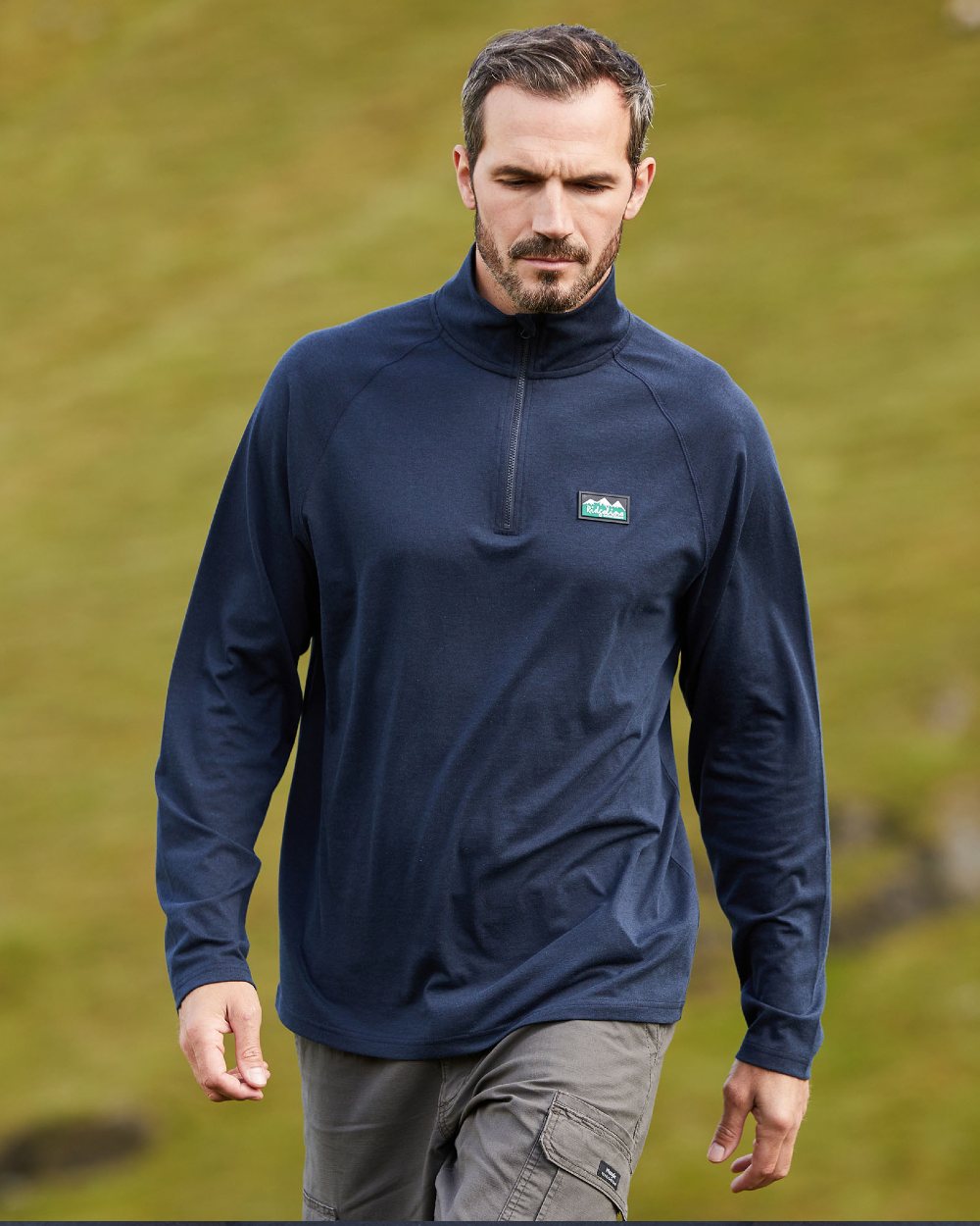Navy Marl Coloured Ridgeline Baseline Pull On Zip Top on outdoor background 