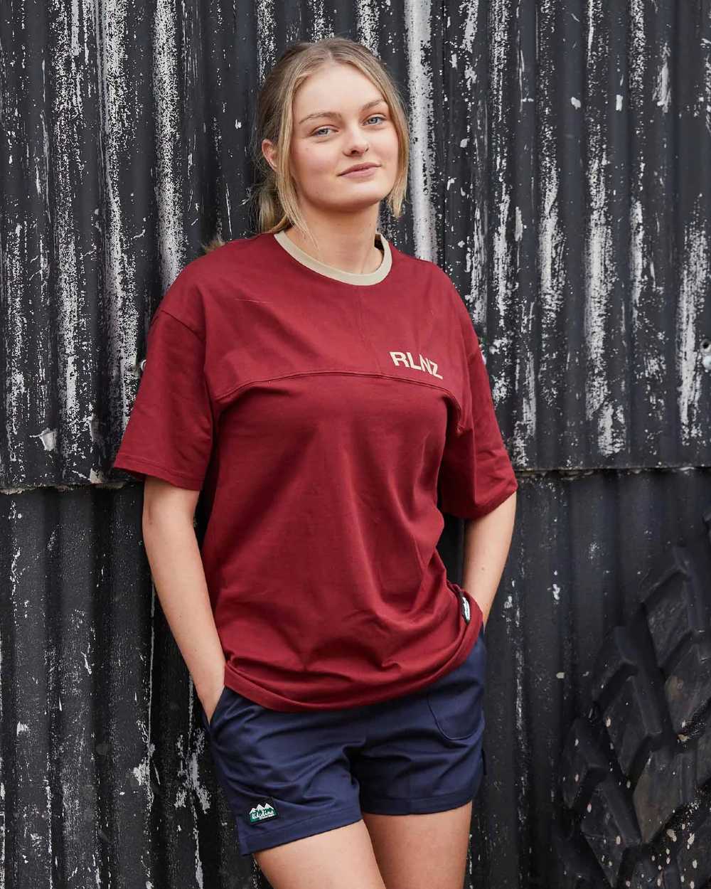 Navy coloured Ridgeline Hose Down Shorts on black wall background 