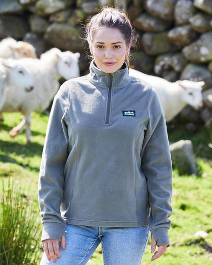 Smokey Olive coloured Ridgeline Ladies Narvik Fleece on mountain background 