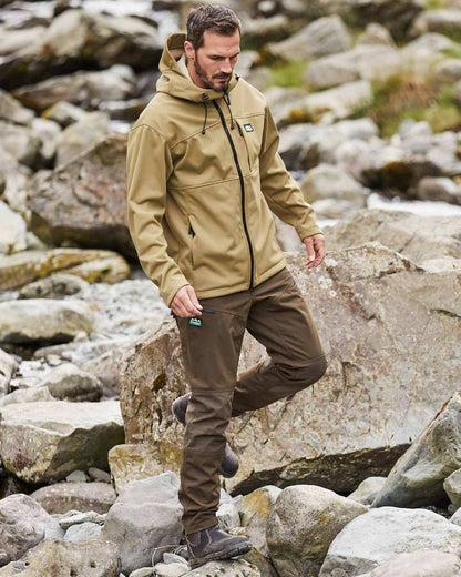 Faded Teak coloured Ridgeline Mens Gradient Jacket on rock background 