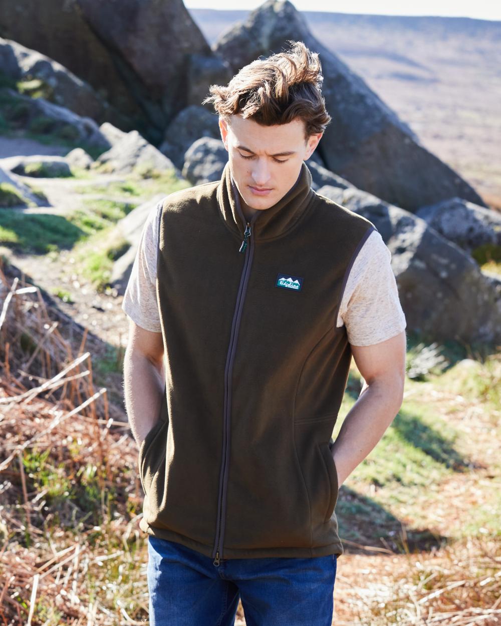 Moody Teak Coloured Ridgeline Mens Kodiak Gilet on hilly background 