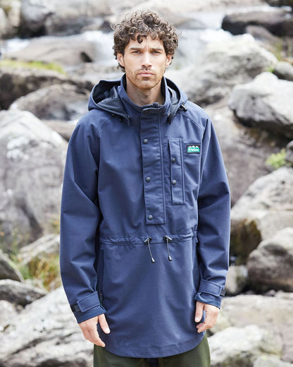 Navy coloured Ridgeline Monsoon Classic Waterproof Smock on rock background 