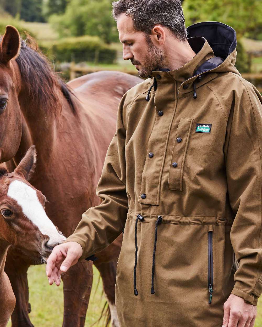 Teak Coloured Ridgeline Monsoon Classic Waterproof Smock on outdoor background 