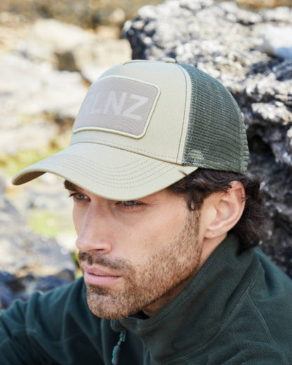Eucalyptus Coloured Ridgeline RLNZ Trucker Cap on outdoor background 