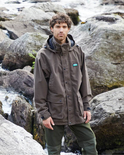 Bark coloured Ridgeline Torrent Waterproof Jacket on hilly background 