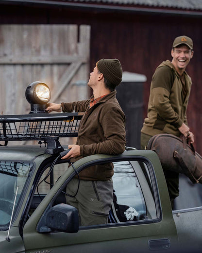 Brown Coloured Seeland Benjamin Fleece on car background 