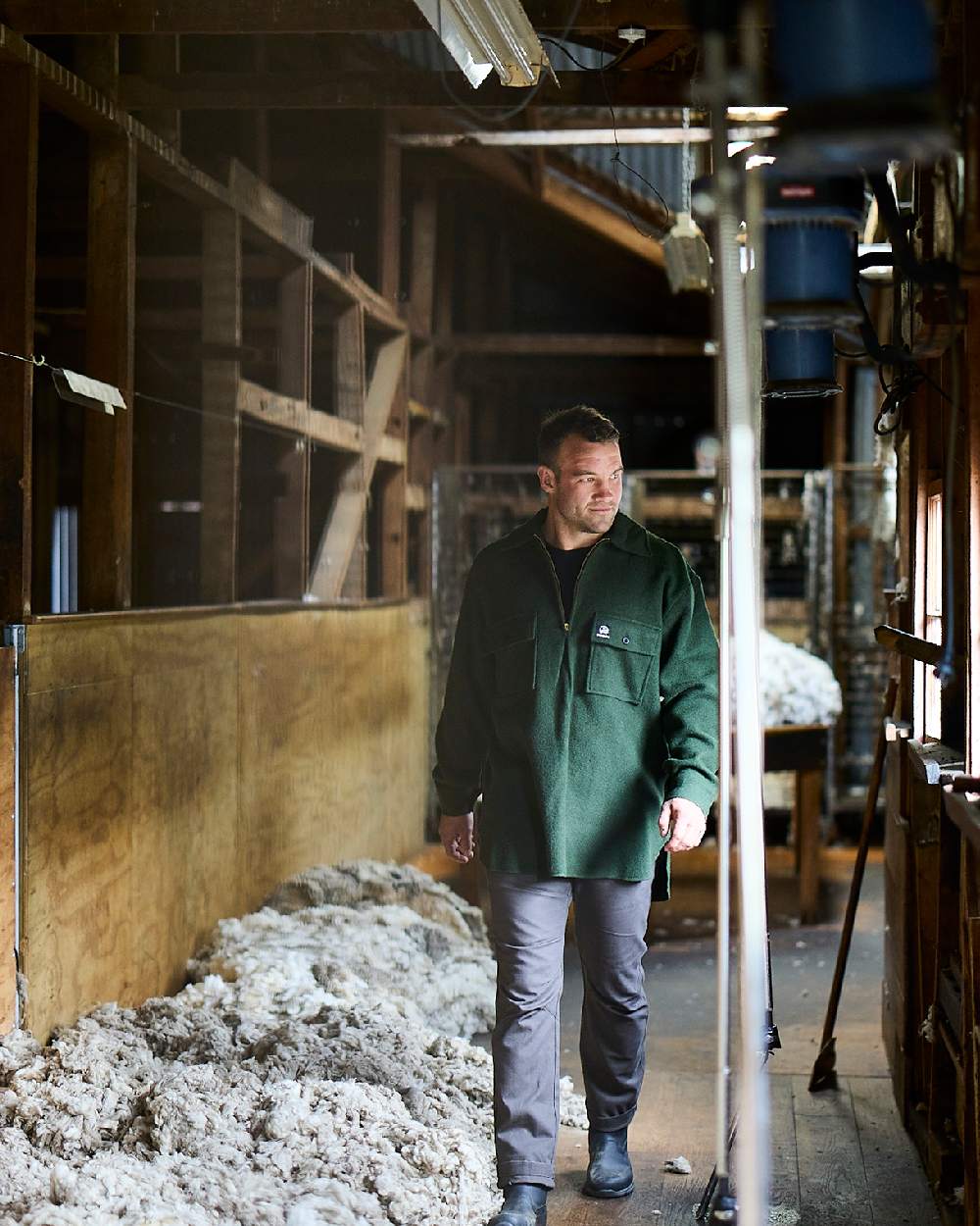 Charcoal Coloured Swanndri Mens Bedrock Canvas Work Pant on factory background 