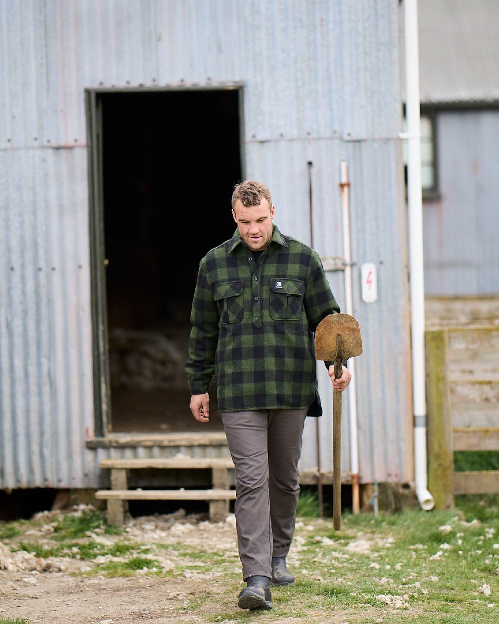 Charcoal Coloured Swanndri Mens Bedrock Canvas Work Pant on house  background 