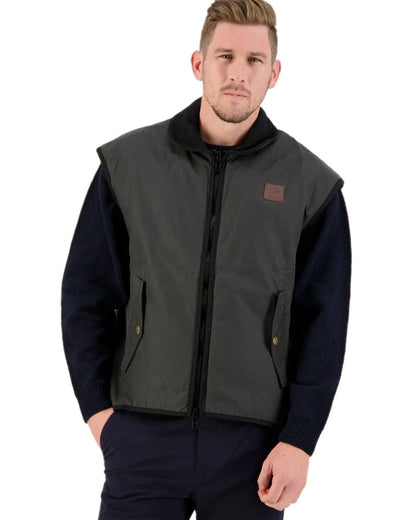 Brown Coloured Swanndri Mens Foxton Oilskin Vest with Wool Lining on white background 