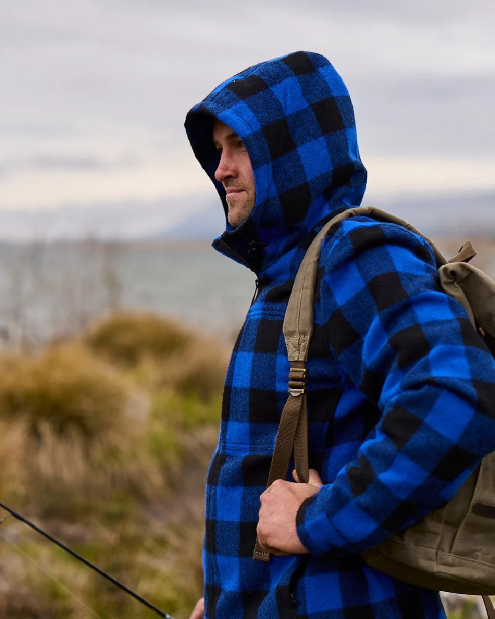Blue Black Check Coloured Swanndri Mens Hudson Wool Hoodie on sea background 