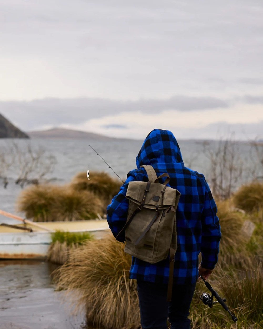 Blue Black Check Coloured Swanndri Mens Hudson Wool Hoodie on sea background 