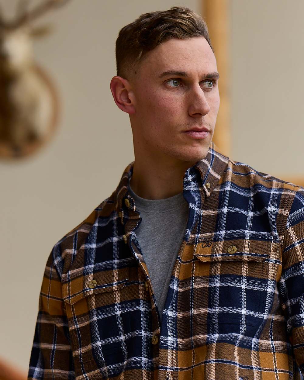 Tan Coloured Swanndri Mens Pencarrow Long Sleeved Shacket on outdoor background 