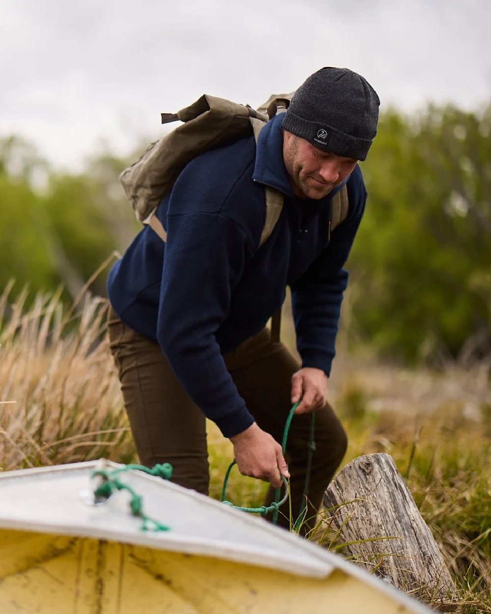 Navy Coloured Swanndri Mens Rhino Stormshield Wool Jersey with Windproof Lining on forest background 
