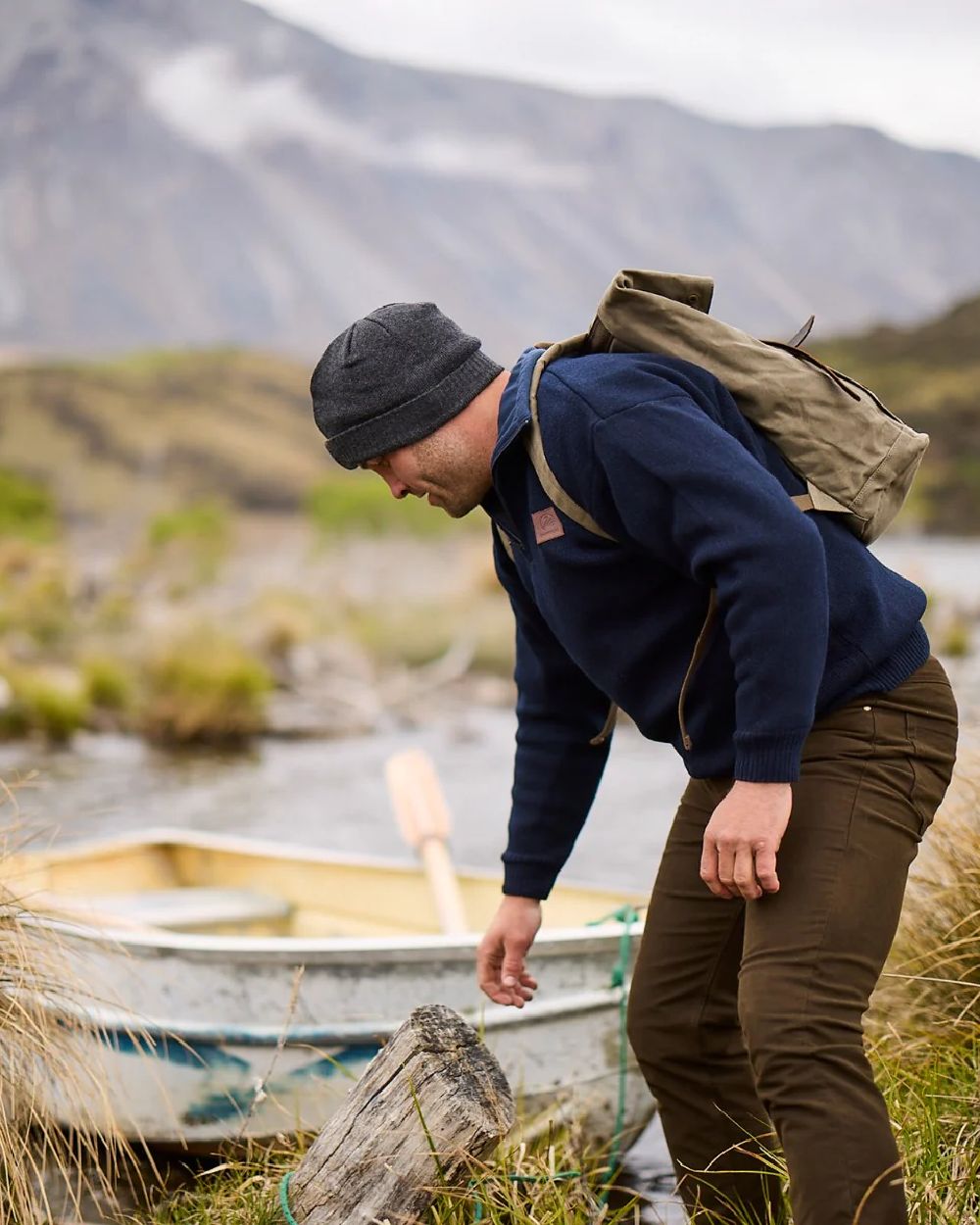Navy Coloured Swanndri Mens Rhino Stormshield Wool Jersey with Windproof Lining on mountain background 