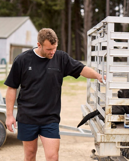 Navy Coloured Swanndri Mens Rugby Short on outdoor background 