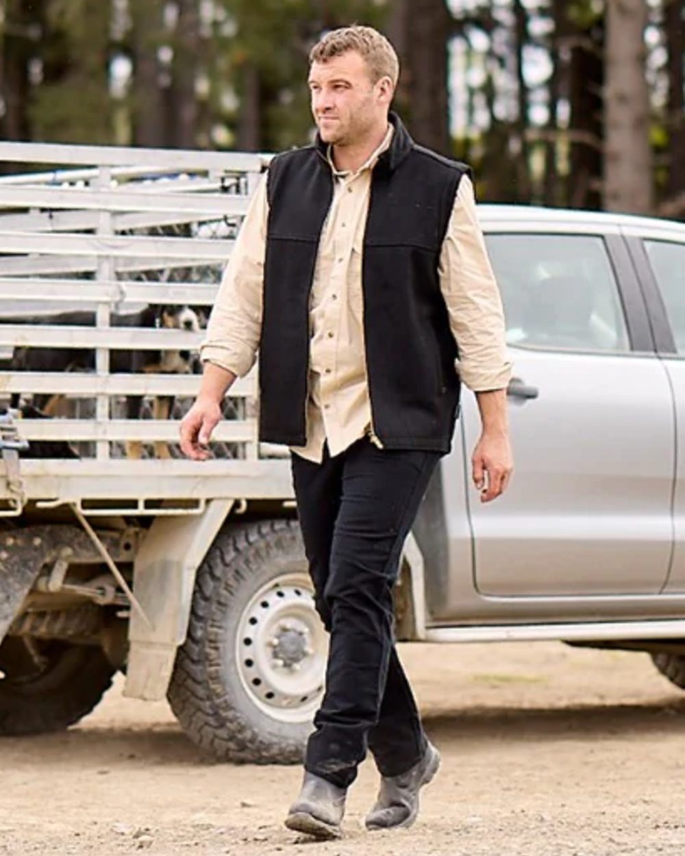 Black Coloured Swanndri Mens Saddleback Wool Vest on outdoor background 