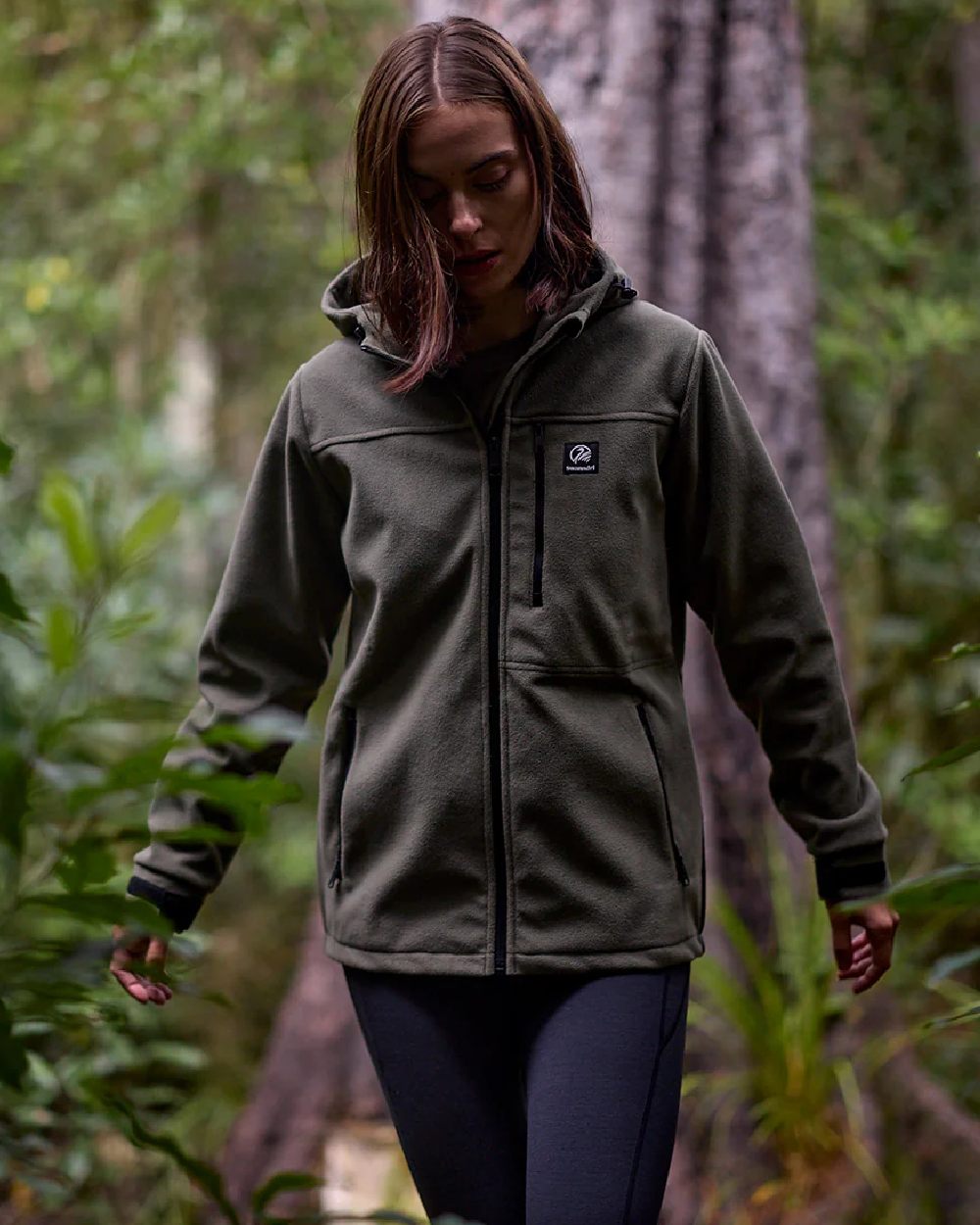 Forest Coloured Swanndri Womens High Rock Stormshield Jacket on outdoor background 