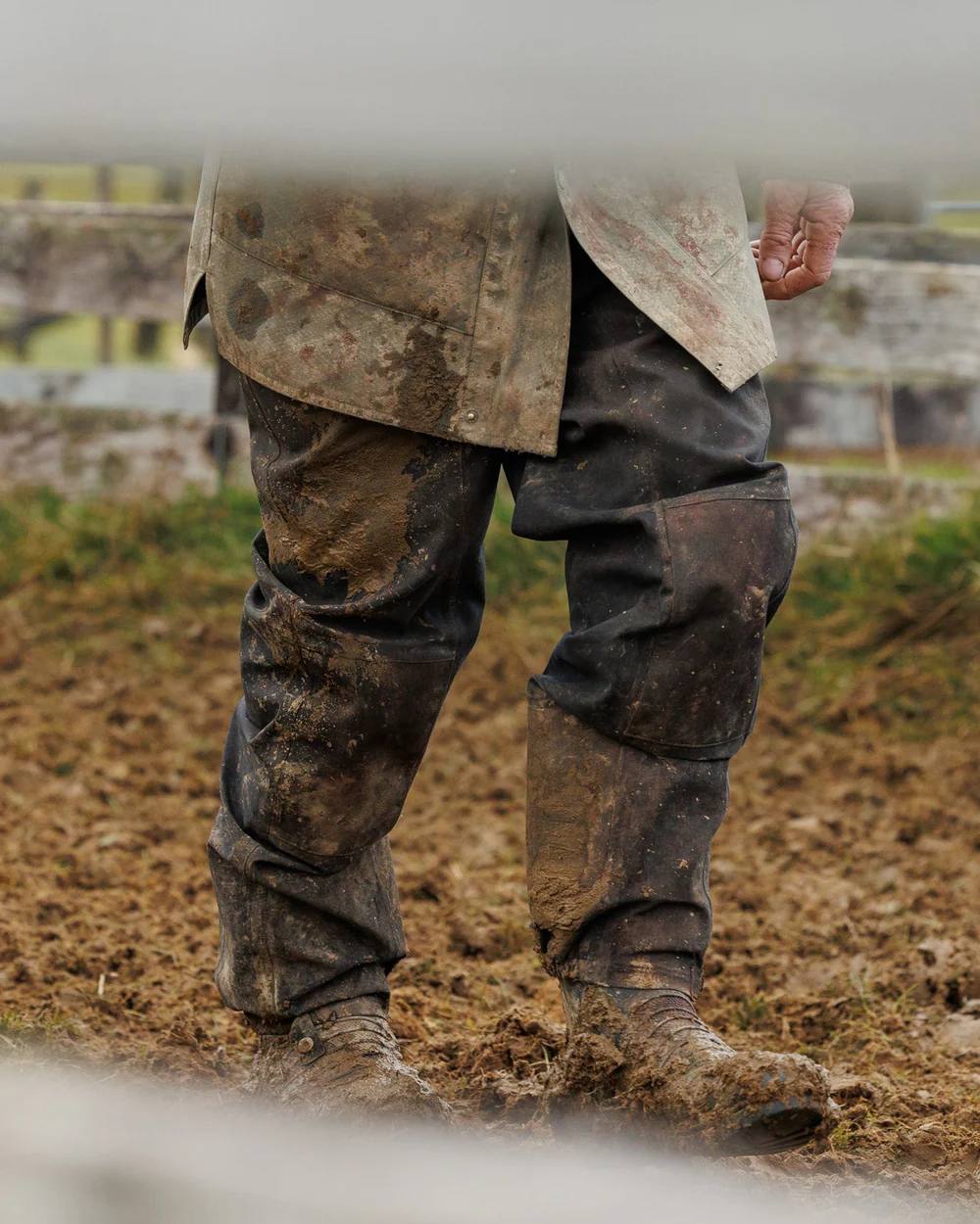 Black Coloured Swazi Torrent Overpants on land background 
