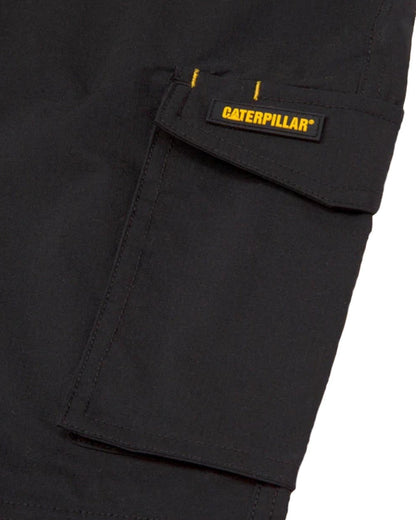 Black Coloured Caterpillar Mens Nexus Knee Pocket Stretch Trousers on White Trousers
