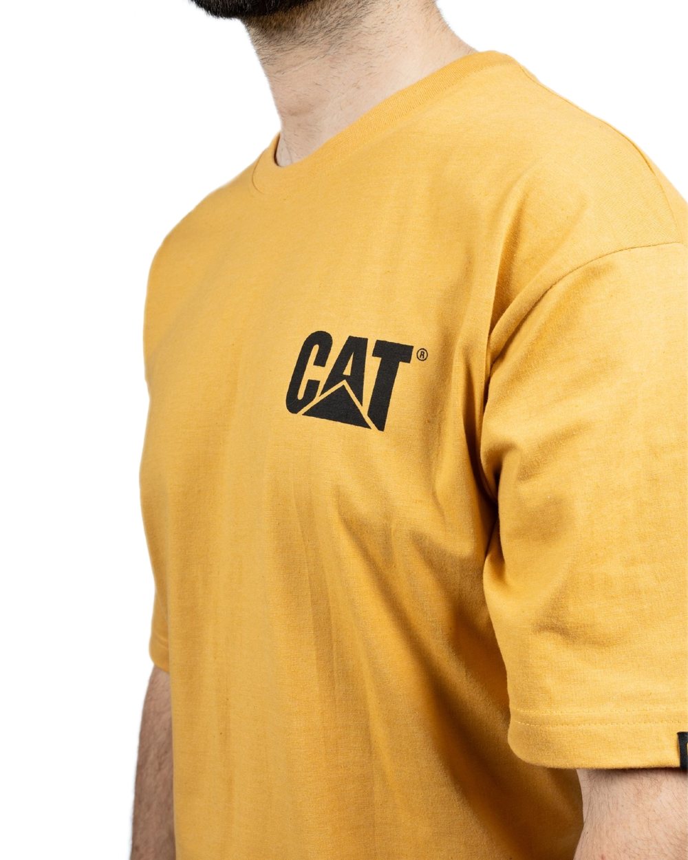 Mustard Coloured Caterpillar Trademark Tee On A White Background 