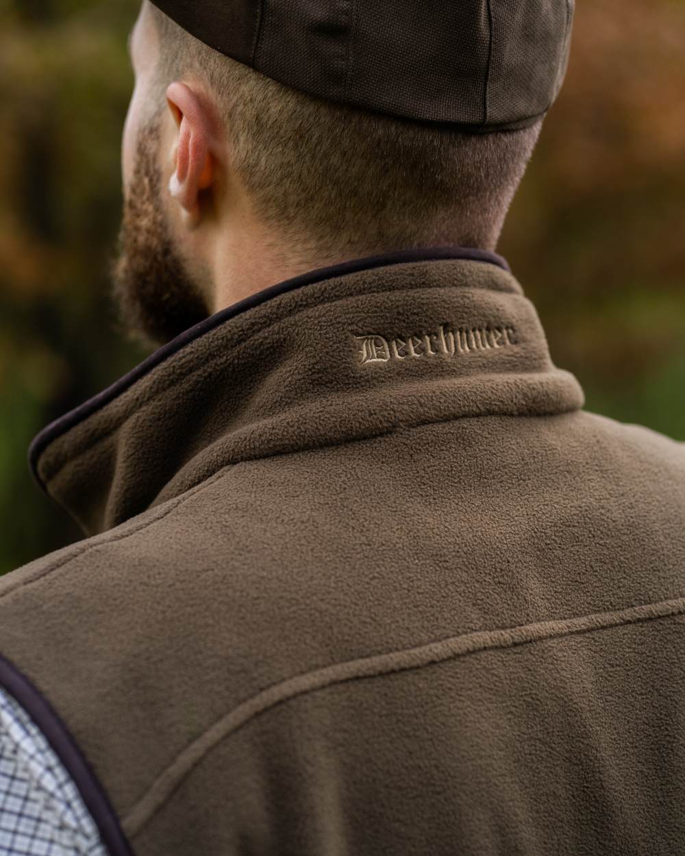 Tarmac Green Coloured Deerhunter Eagle Fleece Waistcoat On A Forest Background 