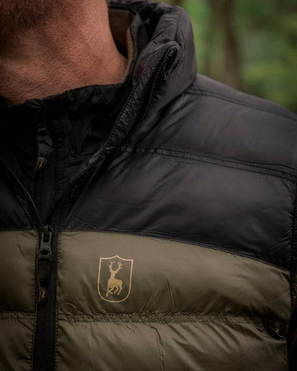 Rifle Green coloured Deerhunter Northward Padded Waistcoat on Forest background 