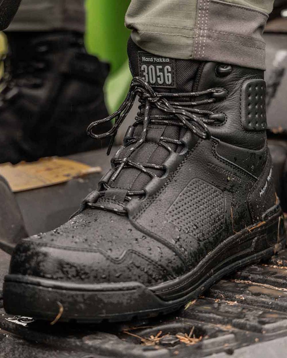 Black Coloured Hard Yakka  Mens 3056 Lace Zip Safety Boots on Outdoor Background

