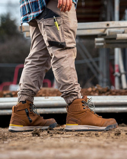 Tobacco Coloured Hard Yakka Mens 3056 S7S 6 Safety Boots on Outdoor Background
