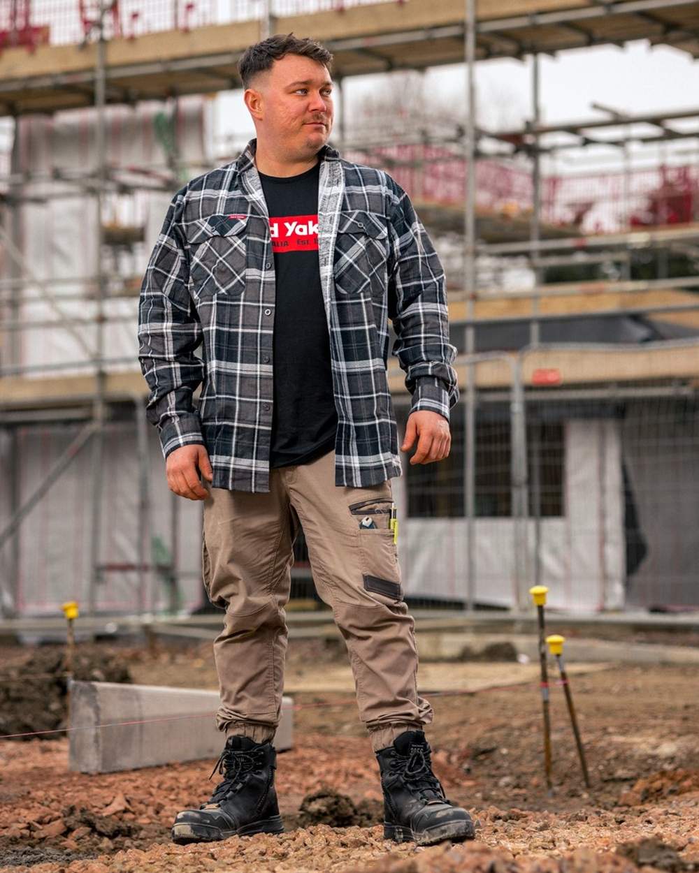 Charcoal Coloured Hard Yakka Mens Lightweight Check Flannel Shirt on Construction Background
