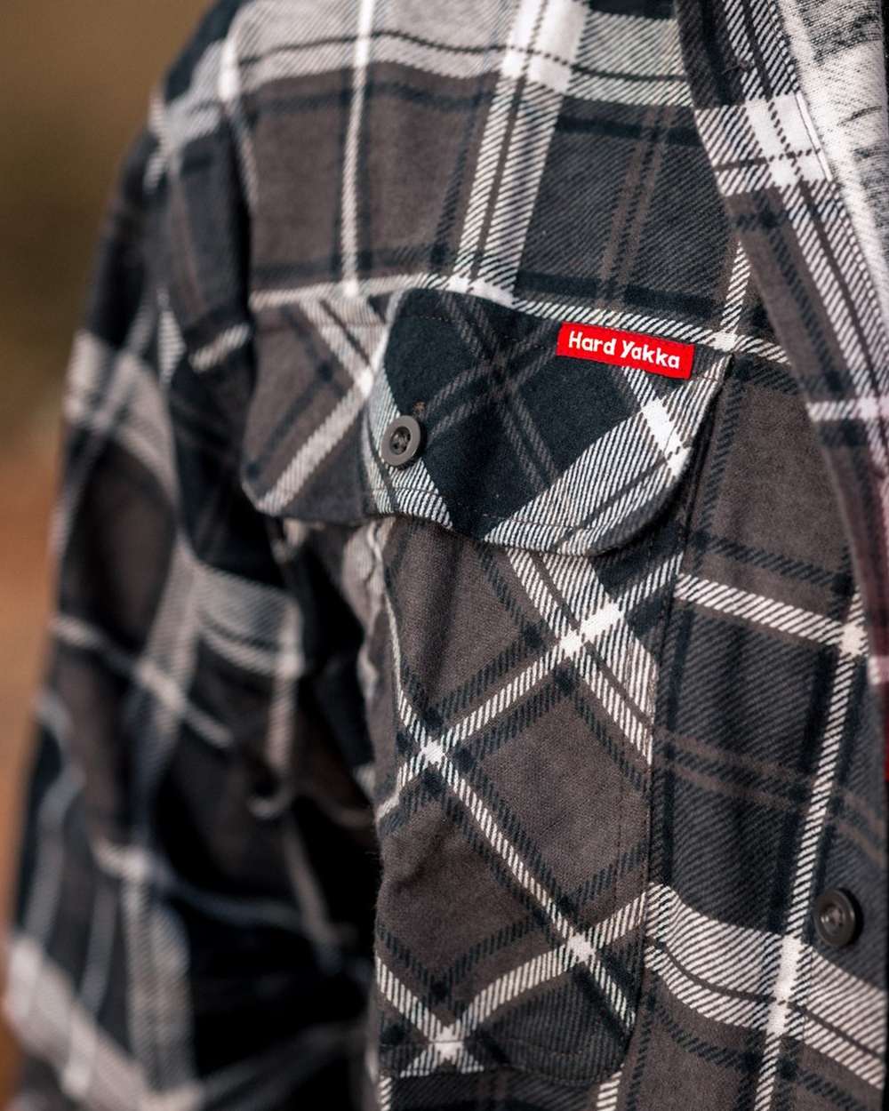 Charcoal Coloured Hard Yakka Mens Lightweight Check Flannel Shirt on Construction Background
