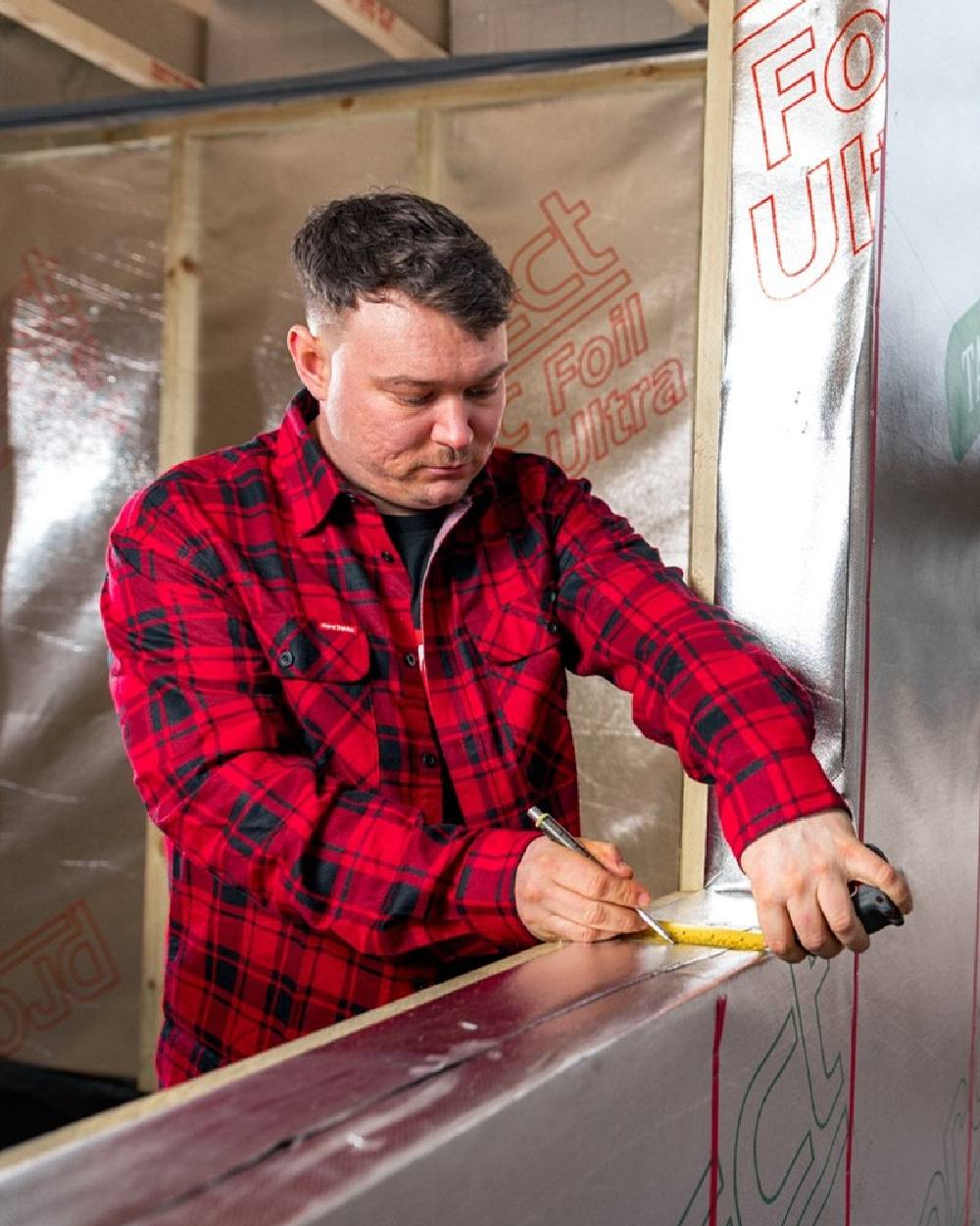 Red Coloured Hard Yakka Mens Lightweight Check Flannel Shirt on Construction Background
