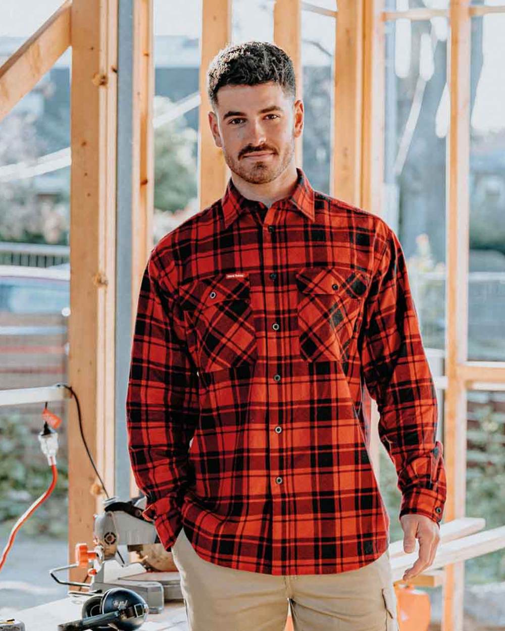 Red Coloured Hard Yakka Mens Lightweight Check Flannel Shirt on Construction Background
