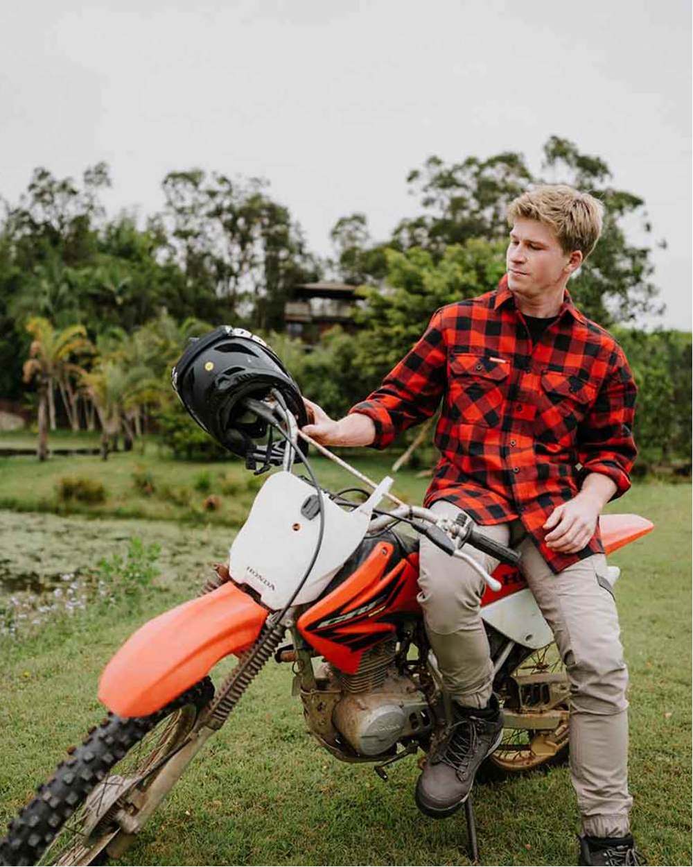 Red Coloured Hard Yakka Mens Long Sleeve Check Flannel Shirt on Outdoor Background
