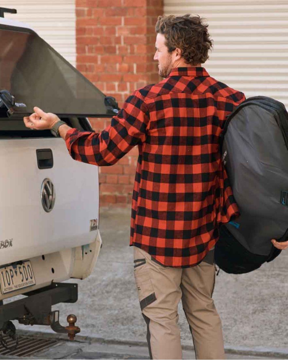 Red Coloured Hard Yakka Mens Long Sleeve Check Flannel Shirt on Outdoor Background
