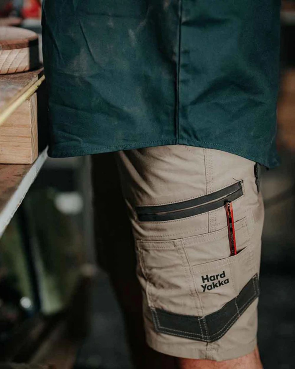 Desert Coloured Hard Yakka Raptor Active Cargo Shorts on Blurry Background
