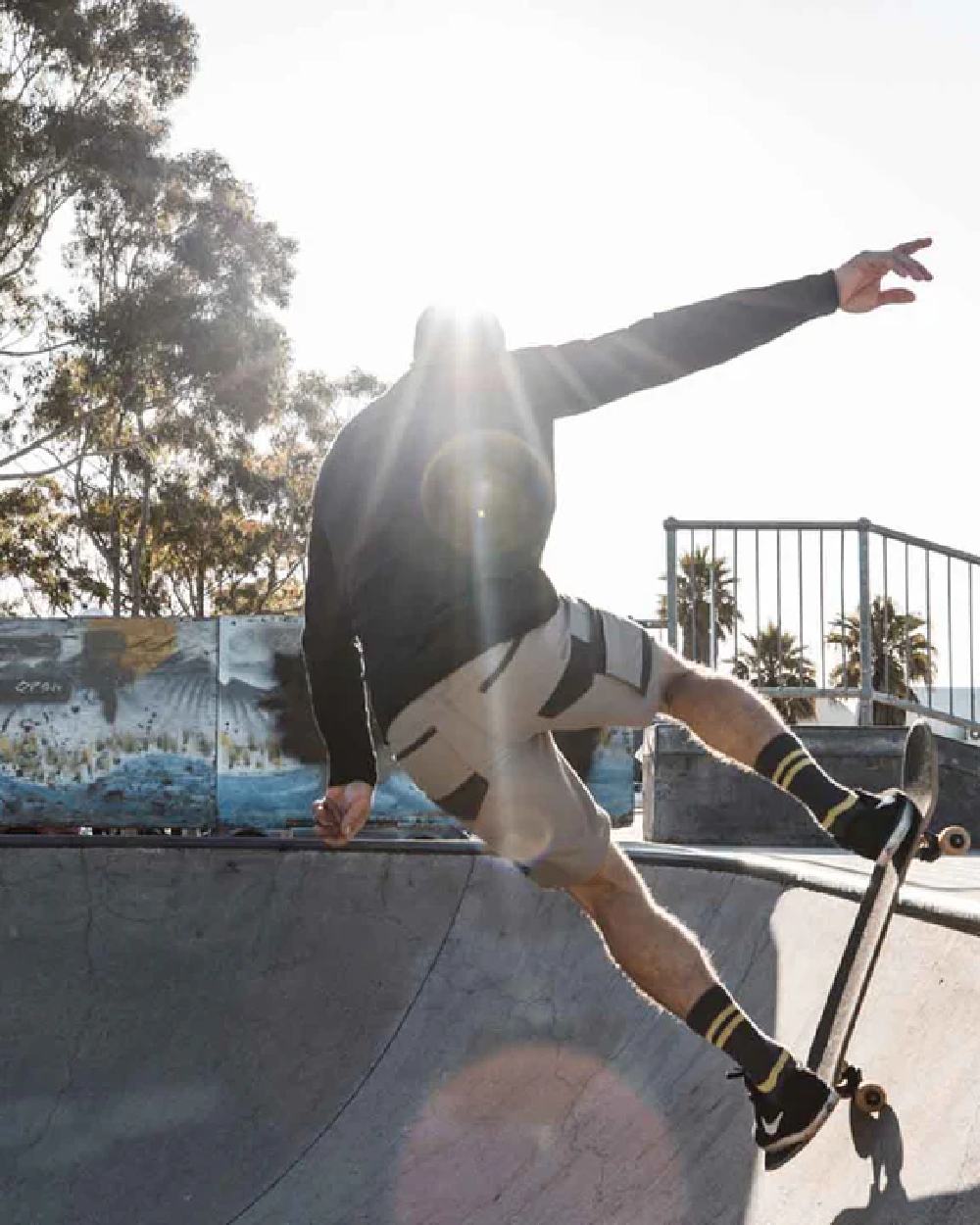 Desert Coloured Hard Yakka Raptor Active Cargo Shorts on Skate Park Background
